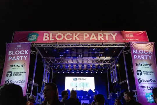 Block Party main stage with sponsor banner wall